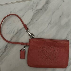 Coach Coral Wristlet Wallet New but marked with numbers in interior